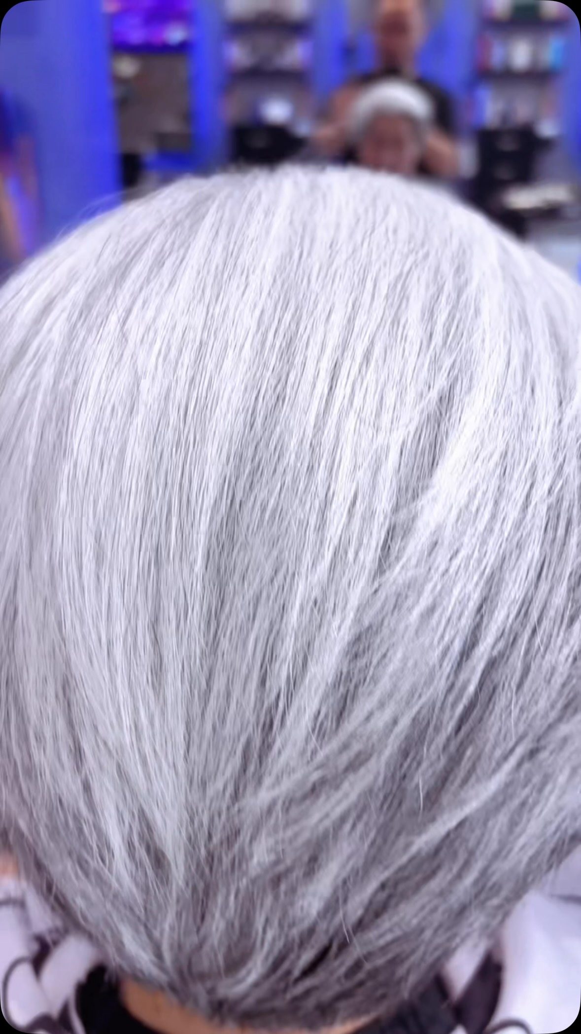 Finished silver-white hair color on a client at Phong Beauty Salon